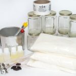 The candle wick, colored in a vibrant hue, is made using what color?