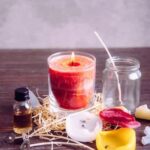 An automated machine shaping molten wax into candles - What is Candle Making Machine