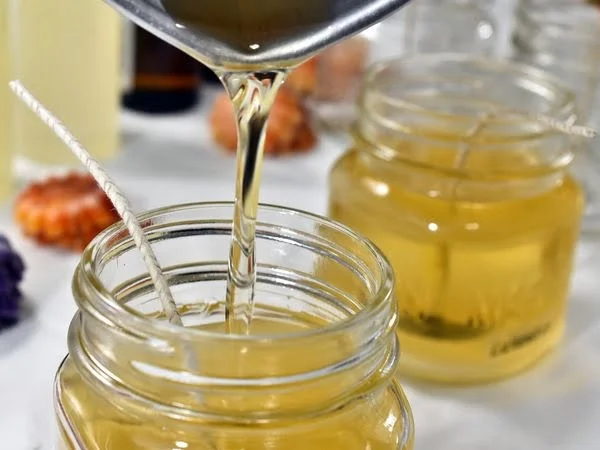 Step-by-step guide to making beeswax candles by dipping method