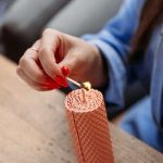 Handcrafted candle making at unique distillery