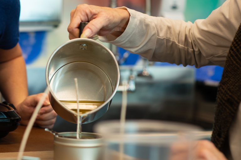 Efficient tool for melting wax in candle-making process