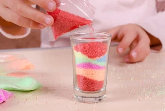 Handcrafting fragrant candles with fresh fruits and herbs for a natural scent experience